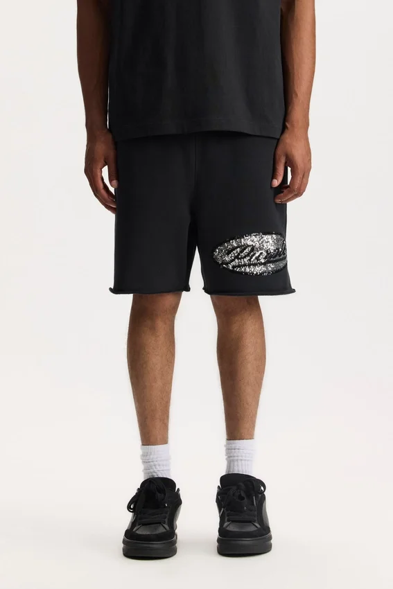 Shorts mit Pailletten-Schriftzug